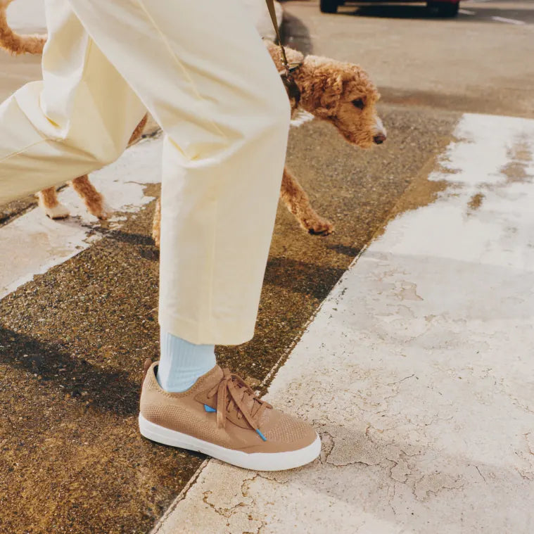 Weekend Classic in Oak Brown splashing through a puddle